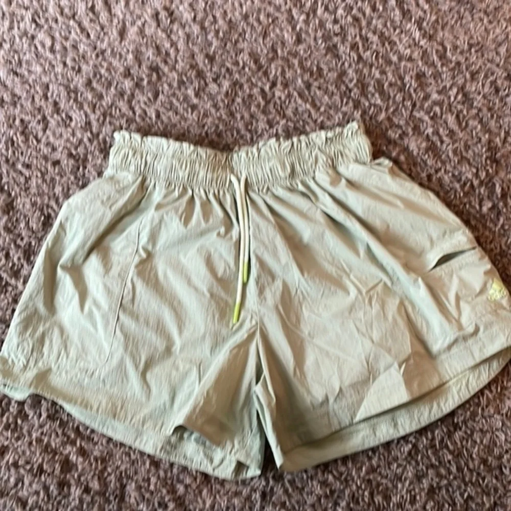 Adidas multi sport shorts green size small